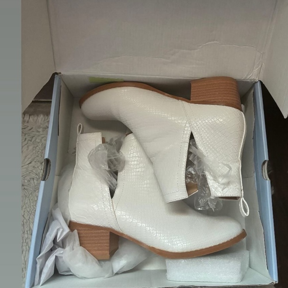 Perforated cowgirl boots